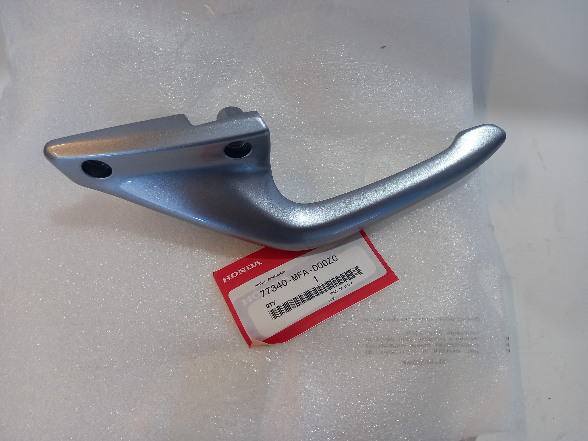 Bild von Honda  HALTESCHIENE, L. H. *NHA4  77340-MFA-D00ZC